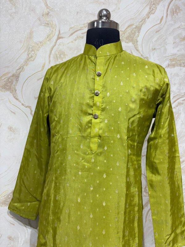 Soft silk men's kurta paired with cream colour pijama