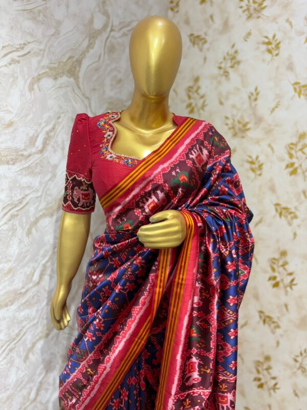 Patola silk saree with heavy maggam work blouse