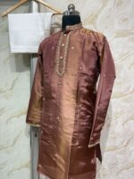 Pure tissue men's kurta with heavy maggam work paired with cream colour pijama