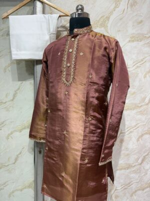 Pure tissue men's kurta with heavy maggam work paired with cream colour pijama