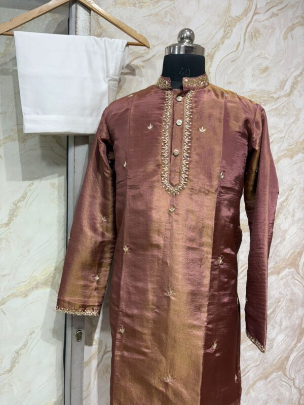 Pure tissue men's kurta with heavy maggam work paired with cream colour pijama