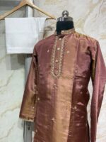 Pure tissue men's kurta with heavy maggam work paired with cream colour pijama