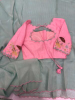 Exclusive designer kanchi organza stripes saree paired with beautiful maggam work blouse