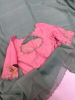 Exclusive designer kanchi organza stripes saree paired with beautiful maggam work blouse