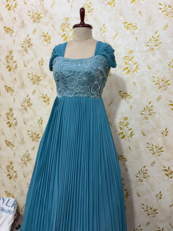 Georgette long gown with heavy flare & floral bead work on yoke part