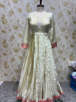 Exclusive designer tissue long gown with heavy sequin work yoke part