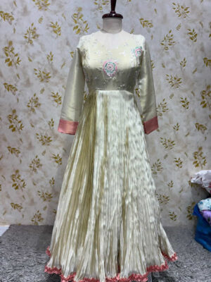 Exclusive designer tissue long gown with heavy sequin work yoke part
