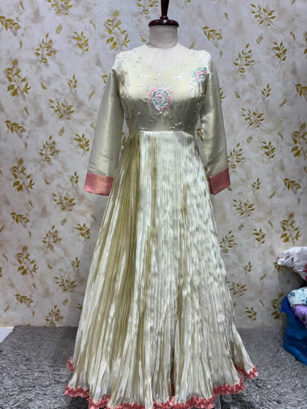 Exclusive designer tissue long gown with heavy sequin work yoke part