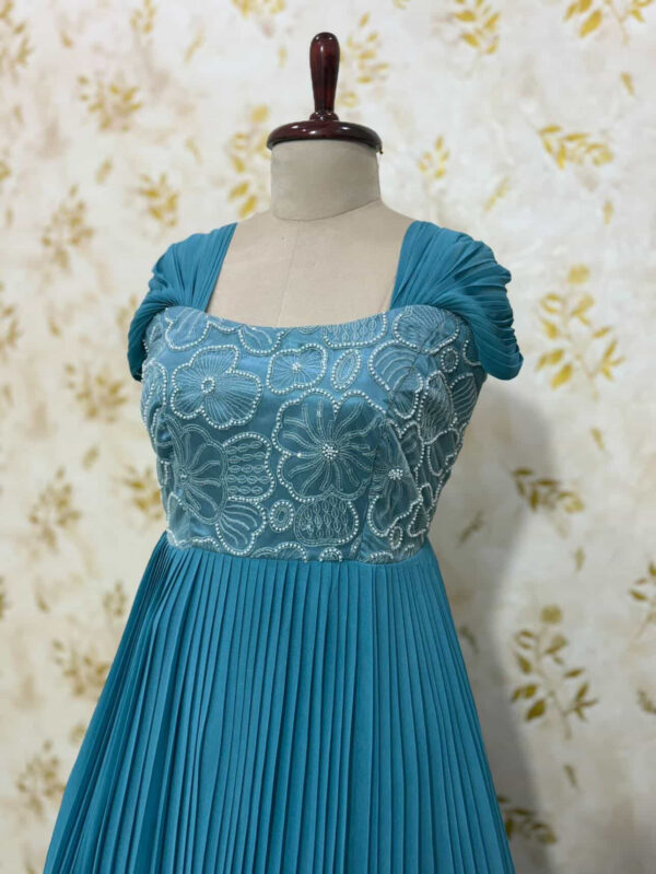 Georgette long gown with heavy flare & floral bead work on yoke part