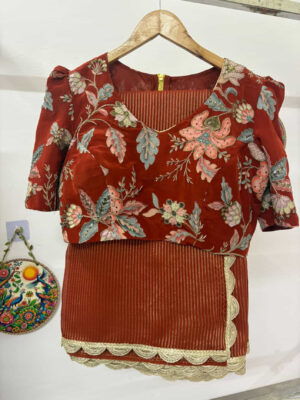 Beautiful tissue saree paired with beautiful designer blouse