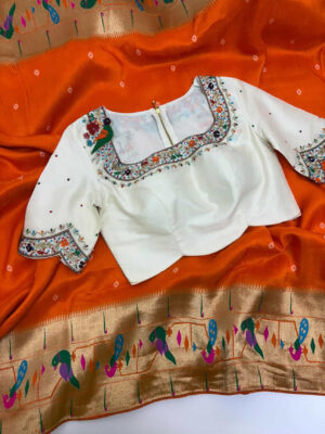 Premium quality bandhini silk saree with paithani border paired with beautiful maggam work blouse