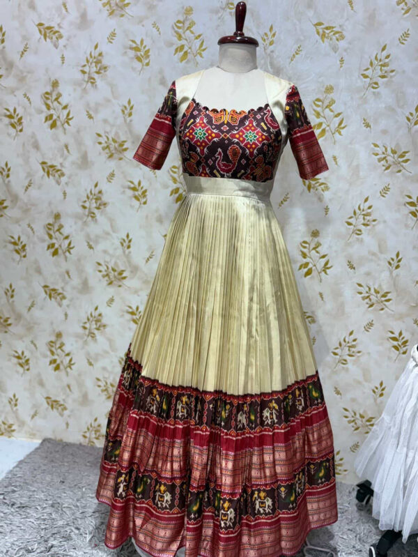 Beautiful patola long frock with heavy flare