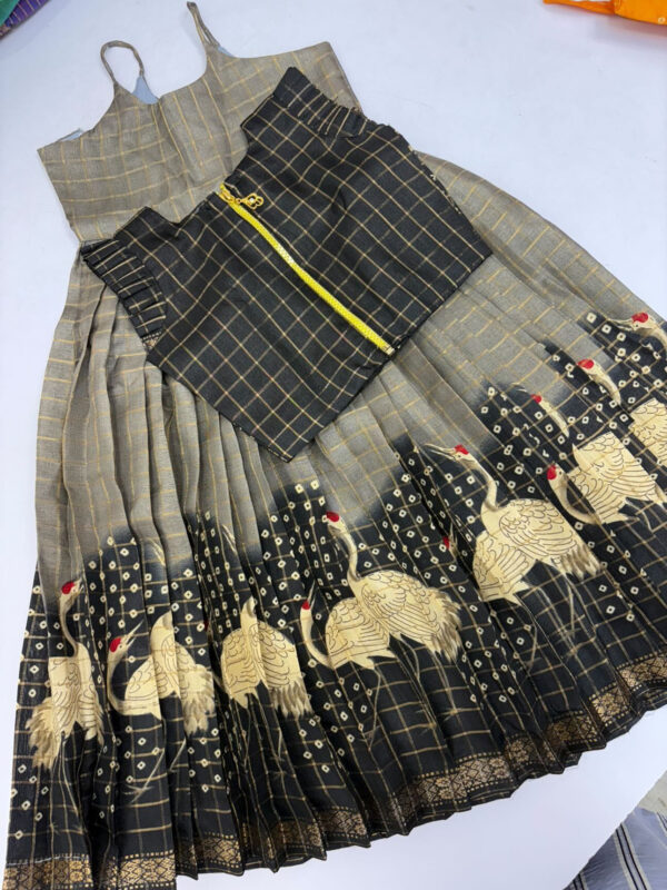 Exclusive designer skirt with swan design teamed up with pretty over coat