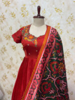 Pure crepe long gown with hand work floral design paired with patola dupatta