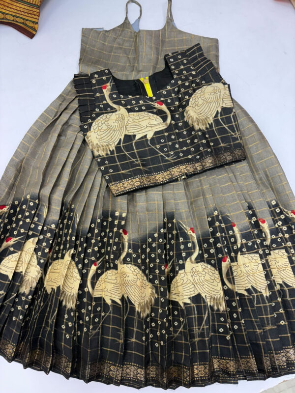 Exclusive designer skirt with swan design teamed up with pretty over coat