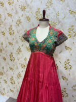 Tissue long gown with heavy embroidery work on yoke part