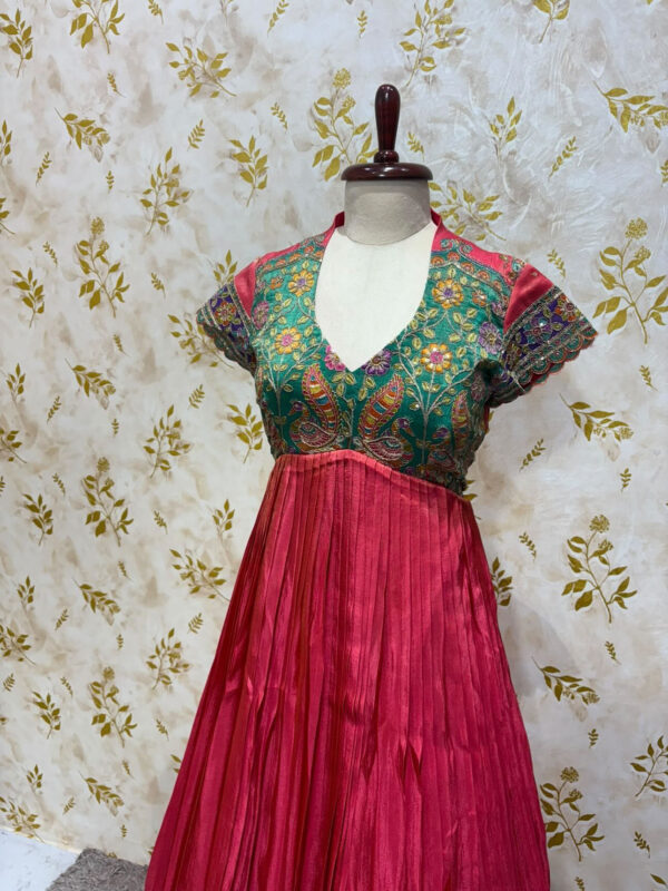 Tissue long gown with heavy embroidery work on yoke part