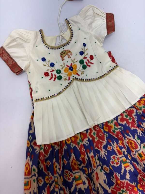 Patola kid lehenga with beautiful maggam work blouse
