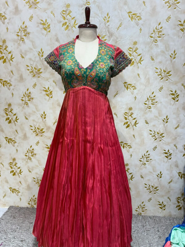 Tissue long gown with heavy embroidery work on yoke part