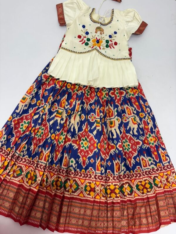 Patola kid lehenga with beautiful maggam work blouse