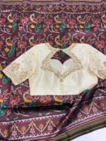 Patola silk saree paired with maggam work blouse