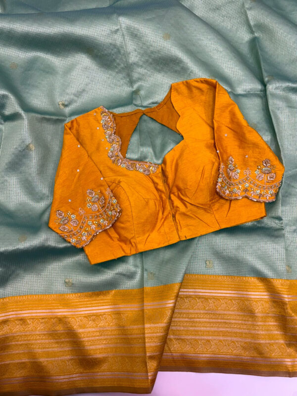 Vintage gadwal saree with maggam work blouse