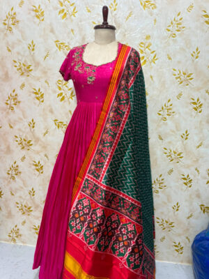 Beautiful long gown with maggam work paired with dupatta