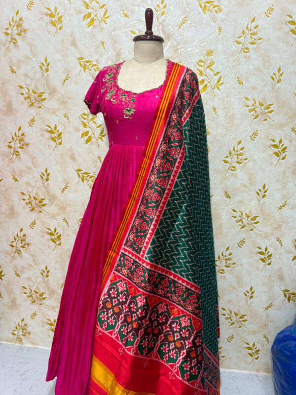Beautiful long gown with maggam work paired with dupatta