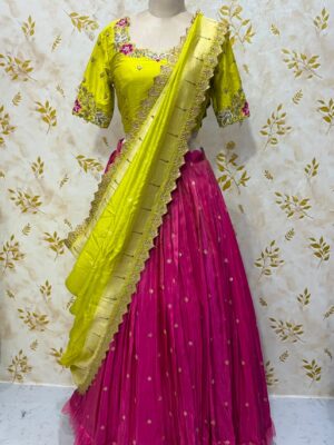 Pure tissue lehenga with net frills Paired with maggam work blouse Pithani dupatta