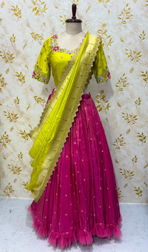 Pure tissue lehenga with net frills Paired with maggam work blouse Pithani dupatta