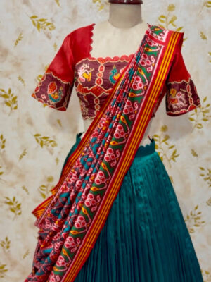 Patola lehenga with maggam highlights on blouse With patola dupatta
