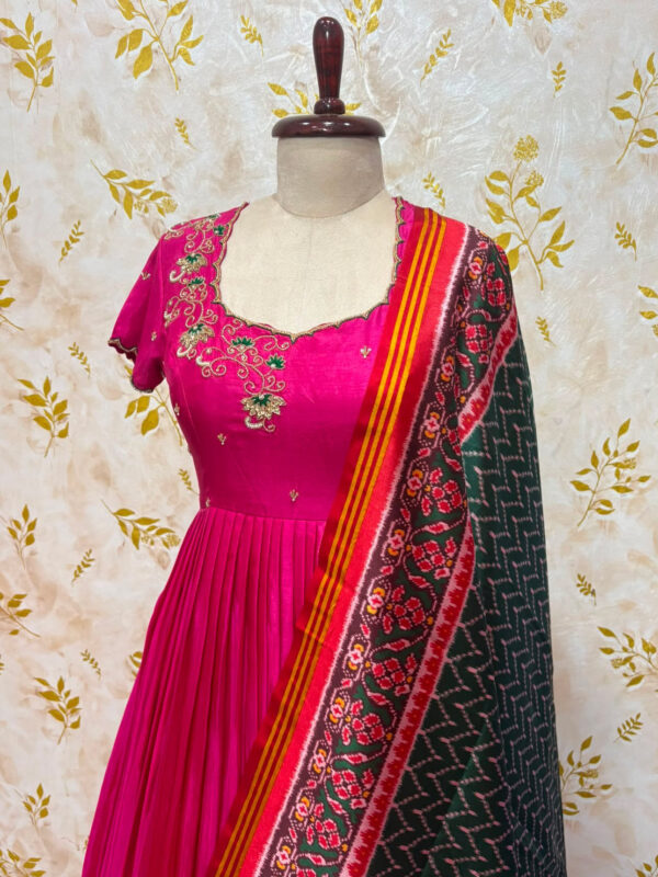 Beautiful long gown with maggam work paired with dupatta