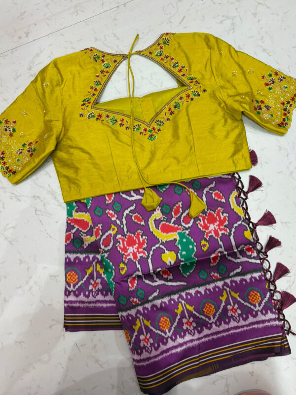 Beautiful Patola saree with maggam work blouse