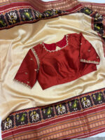 Patola silk saree paired with beautiful maggam work blouse