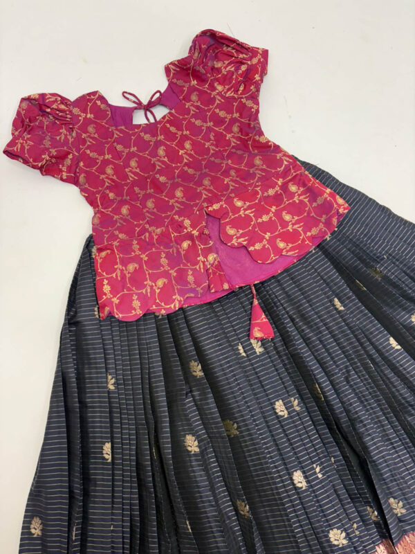 Vintage Gadwal silk lehenga with rich border paired withbanaras pattu blouse