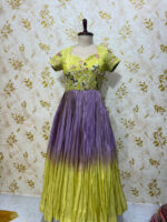 Tissue long gown with beautiful hand work on yoke part