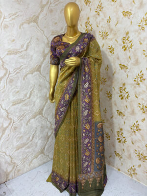 Designer patola fusion wity Kalamkari border saree paired with beautiful bloise