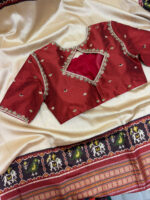 Patola silk saree paired with beautiful maggam work blouse
