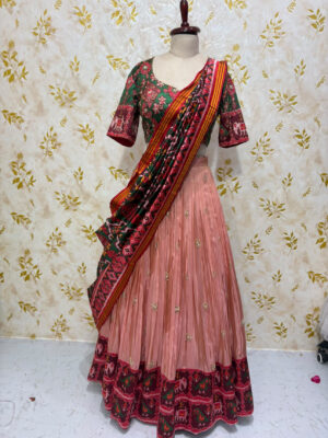 Beautiful patola lehenga with highlighted maggam work blouse