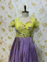 Tissue long gown with beautiful hand work on yoke part