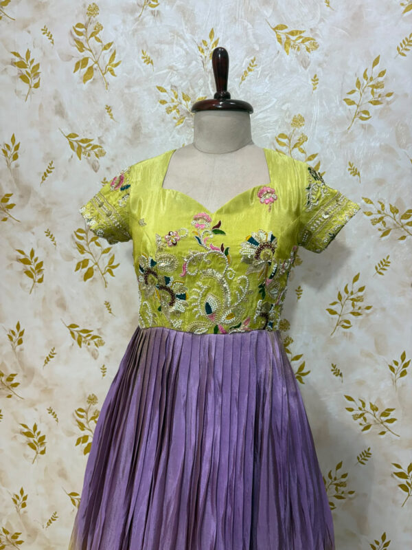 Tissue long gown with beautiful hand work on yoke part