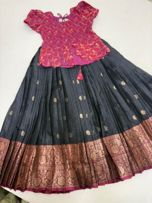 Vintage Gadwal silk lehenga with rich border paired withbanaras pattu blouse
