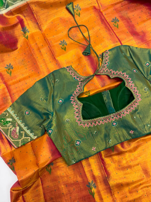 Tissue patola saree with maggam work blouse