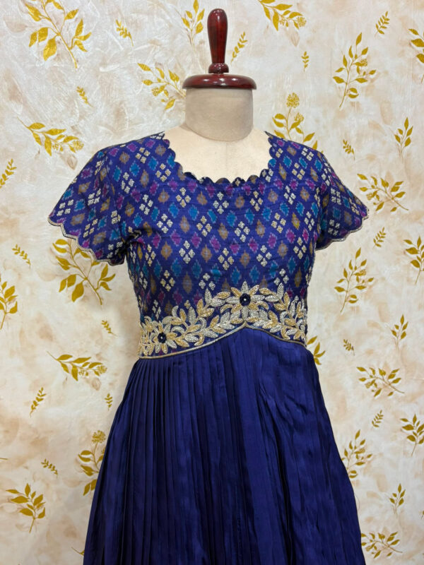 Pure ikkat rawailk long gown with heavy maggam work