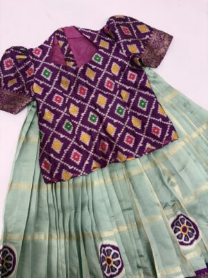 Kanchi pattu inspired lehenga with patola bloise