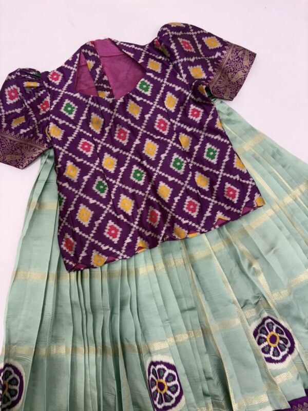 Kanchi pattu inspired lehenga with patola bloise