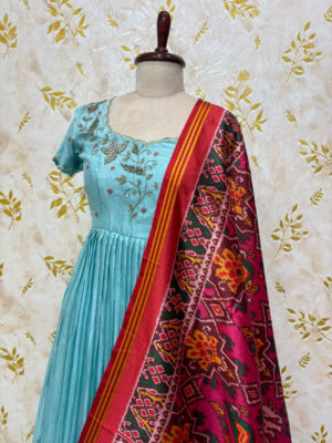 Pure crepe long gown with maggam work paired with patola dupattay