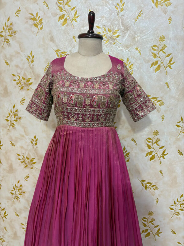 Beautiful tissue long frock with heavy work yoke part