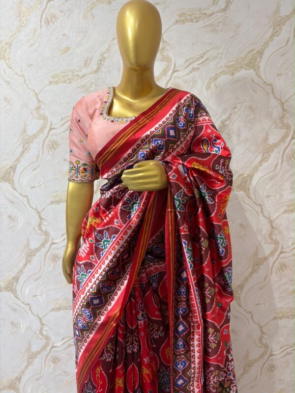 Patola saree with oeach maggam work blouse