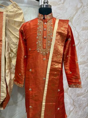 Pure tissue pattu dhoti set with heavy maggam work